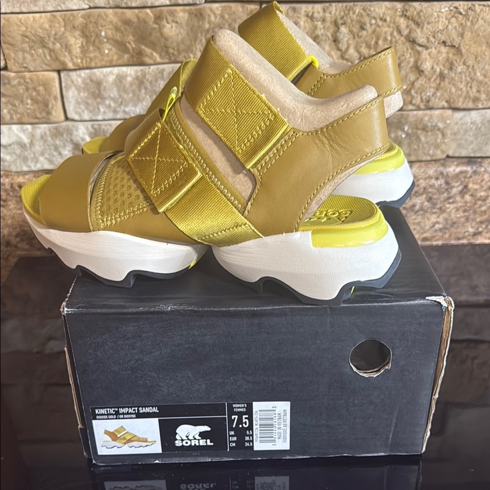 Sorel Kinetic Impact Sandal in Dioxide Gold